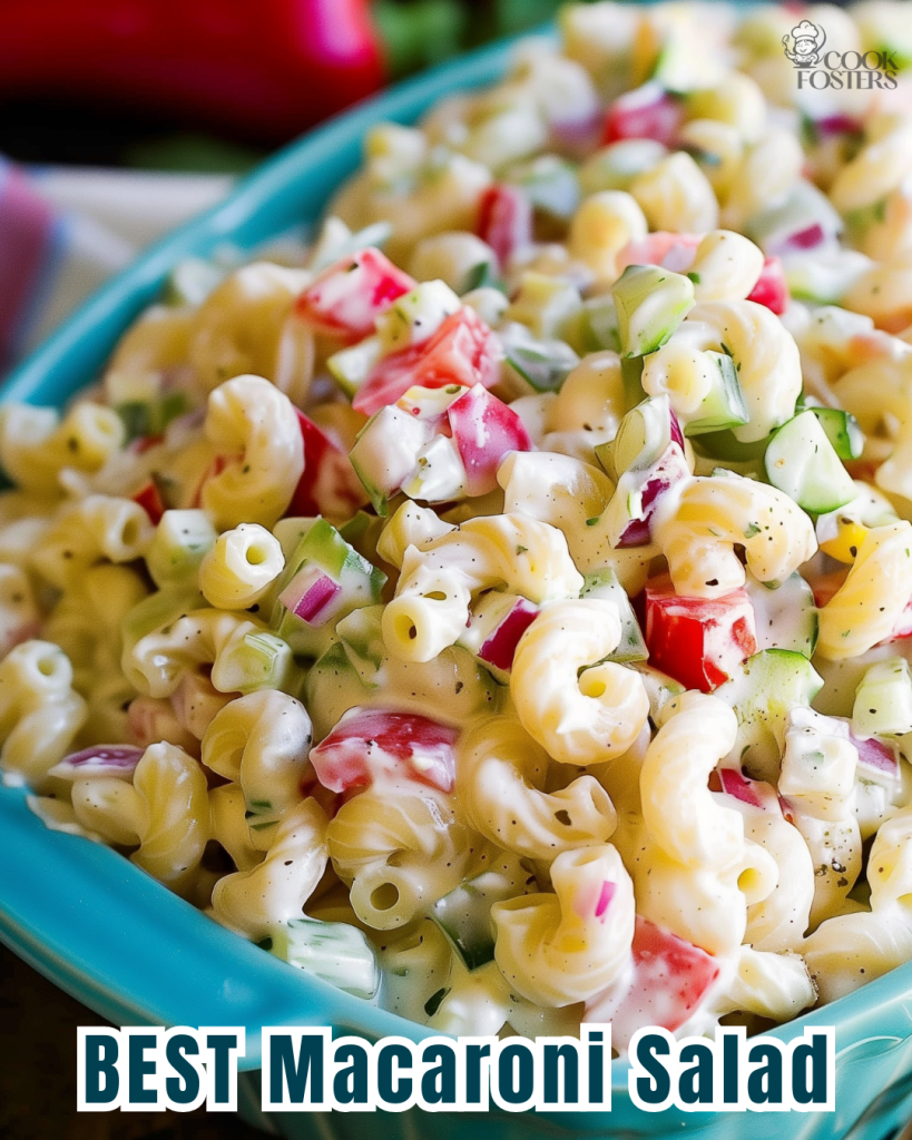 Close-up of delicious creamy macaroni salad in a colorful bowl, showcasing fresh ingredients and perfect for crowd-pleasing events